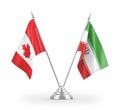 Iran and Canada table flags isolated on white 3D rendering