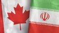 Iran and Canada two flags textile cloth 3D rendering