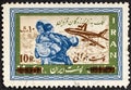 IRAN - CIRCA 1963: Postage stamp printed in Iran shows Homeless in front of ruins, For the earthquake victims serie.