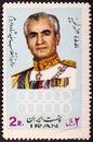 IRAN - CIRCA 1971: Postage stamp printed in Iran shows Mohammad Reza Shah Pahlavi 1919-1980 , 8th anniversary of the