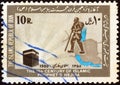 IRAN - CIRCA 1980: A stamp printed in Iran shows Salman Farsi follower of Mohammad, map of Iran and Kaaba, circa 1980. Royalty Free Stock Photo