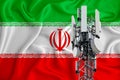 Iran flag, background with space for your logo - industrial 3D illustration. 5G smart mobile phone radio network antenna base