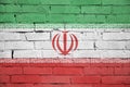 Iran flag is painted onto an old brick wall Royalty Free Stock Photo