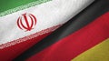 Iran and Germany two flags textile cloth, fabric texture