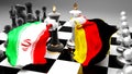 Iran Germany - meeting, debate and dialog between those two countries shown as two chess kings with national flags that symbolize