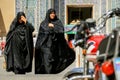 Iran, Persia, Yazd - September 2016: Local people near the mosque on the streets of the old town. Street photo