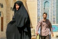 Iran, Persia, Yazd - September 2016: Local people near the mosque on the streets of the old town. Street photo