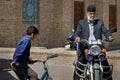 Iran, Persia, Yazd - September 21, 2016: A picturesque local elderly man in a traditional headdress and colorful rings