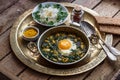 Iranian breakfast made with eggs, bean and dill Royalty Free Stock Photo