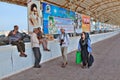 Iranian Island of Hormuz, two tourists go to the pier. Royalty Free Stock Photo