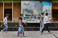 Iranian men walk down the street with shops, Tehran, Iran. Royalty Free Stock Photo