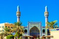 Iranian Mosque on the city street, Dubai, United Arab Emirates. Isolated on blue background Royalty Free Stock Photo