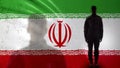 Iranian soldier silhouette standing against national flag, proud army sergeant