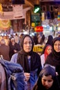 Iranian woman stands in the Oriental bazaar, Tehran, Iran.