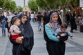 Iranian women walk down the street, Tehran, Iran.