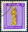 IRAQ - CIRCA 1973: A stamp printed in Iraq shows a statue of a Goddess, circa 1973.