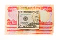 Iraqi Dinars and American Dollar Royalty Free Stock Photo