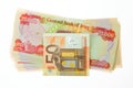 Iraqi Dinars and fifty Euro Note Royalty Free Stock Photo