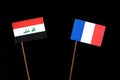 Iraqi flag with French flag isolated on black Royalty Free Stock Photo