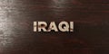 Iraqi - grungy wooden headline on Maple - 3D rendered royalty free stock image