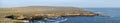 Ireland Aran island cliffs and stone wall panorama