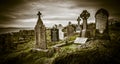 Ireland celtic cross at medieval church cemetery.