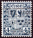 IRELAND - CIRCA 1922: A stamp printed in Ireland shows Arms of the four provinces.