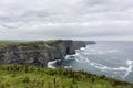 Ireland countryside tourist attraction in County Clare. The Cliffs of Moher and castle Ireland. Epic Irish Landscape UNESCO Global