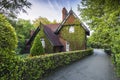 Ireland - Dublin - Mysterious hidden ivy-covered Ardilaun Lodge aka the Gardener`s Cottage surrounded by St Stephen`s Green pa Royalty Free Stock Photo