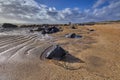 Ireland, Fanore beach with intensive orange sand and black