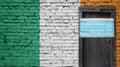 Ireland flag painted on brick wall and closed door with medical mask protected