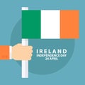 Ireland Independence Day, 24 april, greeting card with hand holding irish flag.