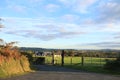 Exploring Ireland Countryside - greenary, blue sky, small houses - Irish countryside tours