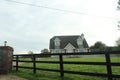 Exploring Ireland Countryside - greenary, blue sky, small houses - Irish countryside tours