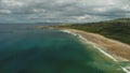 Ireland sand beach aerial view: ocean waves, sandy coastline, white shore, greenery meadow