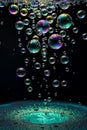 Iridescent Bubbles Floating Above a Textured Surface Play of Light and Shadow Creates a Dreamlike Atmosphere Visual Delight Royalty Free Stock Photo
