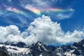 Iridescent cloud over the road to Stelvio pass Lombardy at summer