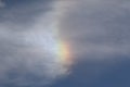 Iridescent clouds on a blue sky Royalty Free Stock Photo
