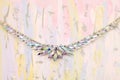 Iridescent crystal necklace on fine art background Royalty Free Stock Photo