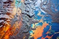 iridescent oil spill on water surface