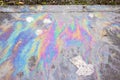 Rainbow iridescence from oil spill Royalty Free Stock Photo