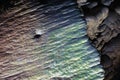 Iridescent rock formation in underground cave in rural Vietnam