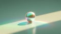 Iridescent sphere on smooth surface with colorful reflections and soft shadows under gentle lighting Royalty Free Stock Photo