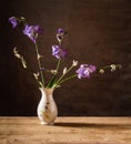 Iris flowers bouquet inside rlegant ceramic vase