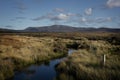 Irish bogland with a small stream flowing through.