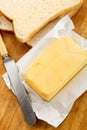 Irish butter with fresh sliced bread on a wooden board Royalty Free Stock Photo