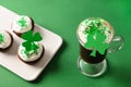 Irish coffee and special cupcakes for Happy St Patricks Day Royalty Free Stock Photo