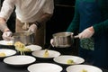 Irish colcannon served in a white bowl or traditional mashed potato with addition of kale, leek and green onion, close-up Royalty Free Stock Photo