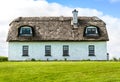 Irish cottage with thatch roof Royalty Free Stock Photo