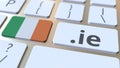 Irish domain .ie and flag of Ireland on the buttons on the computer keyboard. National internet related 3D rendering